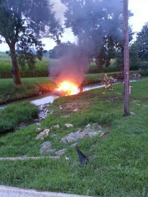 July, 2013 Vehicle Rollover, in the Creek W/Fire